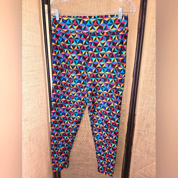 Disney Pants - NWOT Women's Disney Epcot Muticolor Geometric Print Leggings Size Medium